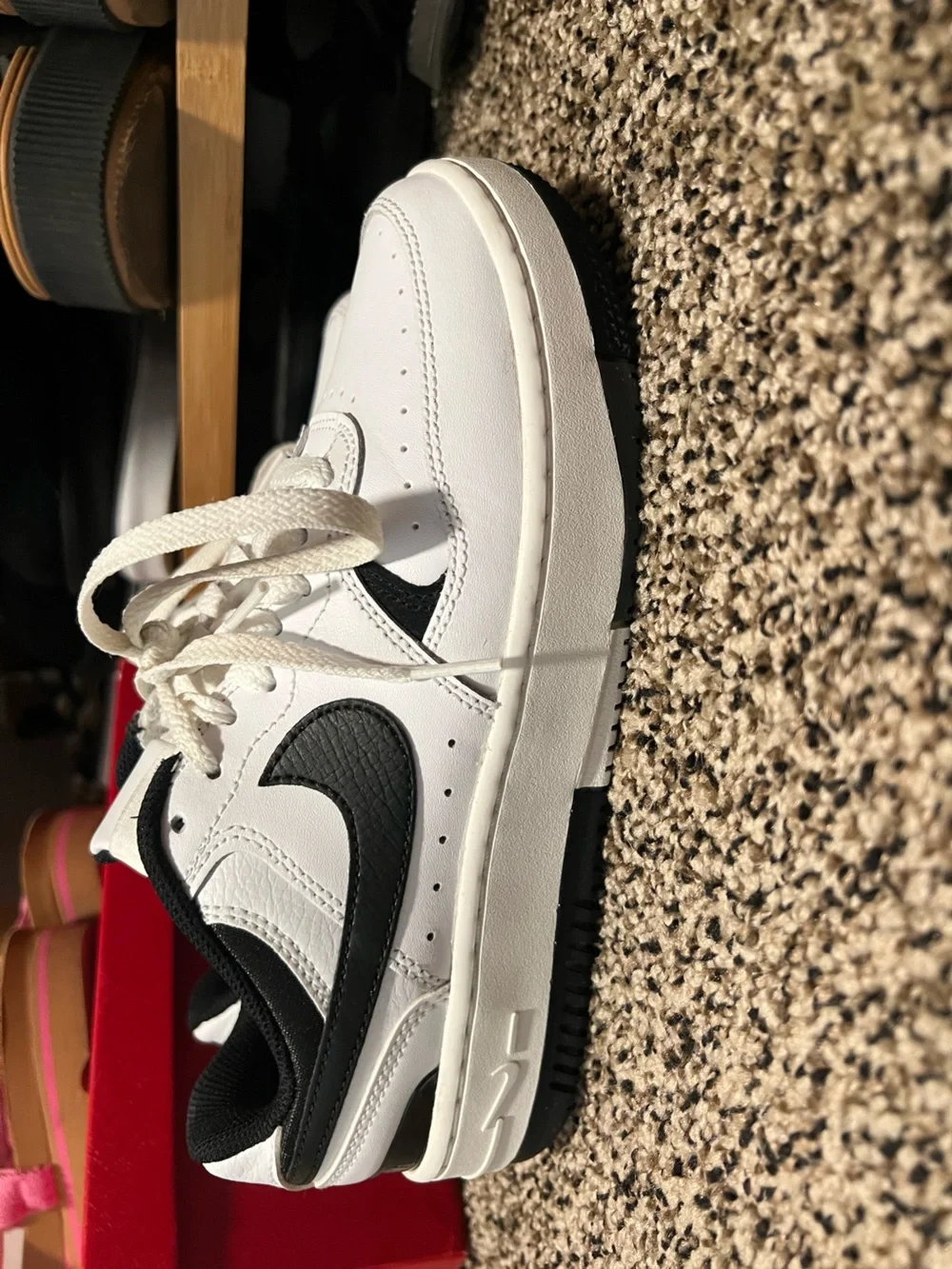 Nike Women's White Sneakers with Black Swoosh